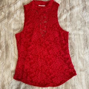 Red sleeveless shirt